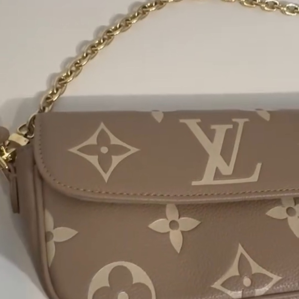 Louis Vuitton Tan Monogram Clutch